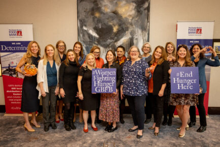 Women Fighting Hunger group pose during GBFB's Women Fighting Hunger breakfast